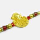 Awesome Looking Golden Color Emerged Divine Ganesha Rakhi for Brother