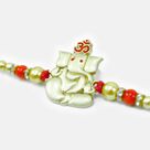 Om and Ganesha Special Elegant Looking Pearl Beaded Divine Rakhi