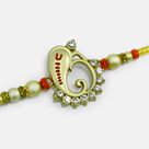 Antique Looking Awesome Color Jewel Studded Ganesha with Golden Beads Rakhi for Brother
