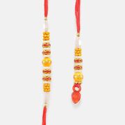 Nice-looking Pearl and Red Diamond with Mauli Pair of Rakhi