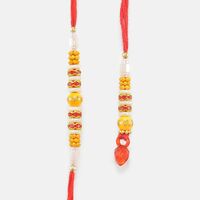 Nice-looking Pearl and Red Diamond with Mauli Pair of Rakhi
