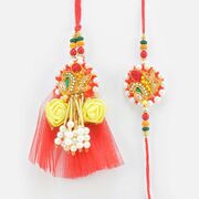 Zardosi Design Rich Looking White Pearl Unique Rakhis for Brother and Sister in Law