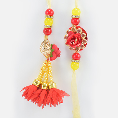Red and Golden Color Pair of Astonish Rakhis for Bhaiya and Bhabhi