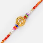 Beautiful Golden Base Diamonds Rakhi with Multicolored Gems