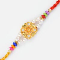 Golden Base Studded Diamond Rakhi with Pearl and Gems