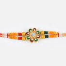 Floral Shape Studded Diamond Sandalwood Rakhi
