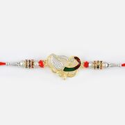 Silver and Golden Peacock Shape Pearl Rakhi
