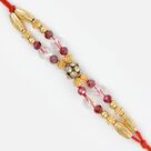 Floral Design Base Diamond Work Rakhi with Muliti- Design Red Beads