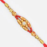 Alluring Diamond Rakhi in Golden Beads
