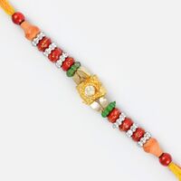 Glaring Silver Golden and Red Beaded Rakhi with Diamond