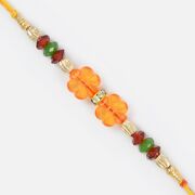 Transparent Floral Design Glass and Golden Beads Moli Rakhi