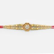 Flower Shape Design Jewel Studded in Mid Lovely Looking Golden Color Beads Rakhi