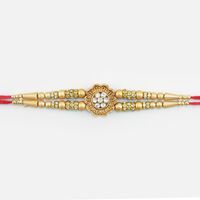 Flower Shape Design Jewel Studded in Mid Lovely Looking Golden Color Beads Rakhi