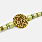 New Om Written on Brown Base Flower Shape Amazing Looking Beads Rakhi for Brother