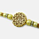 New Om Written on Brown Base Flower Shape Amazing Looking Beads Rakhi for Brother