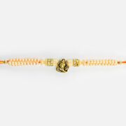 Awesome Looking Elegant Ganesha in Mid with Pearl Type Beads Rakhi for Brother