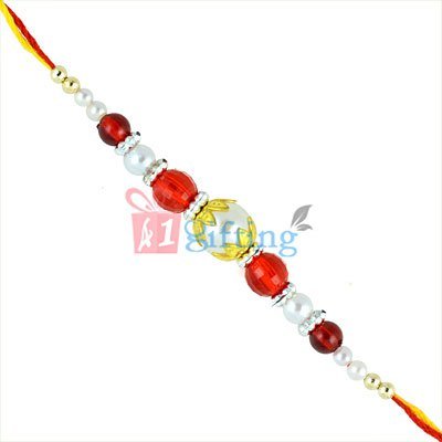 Pearl and Red Glass Beads in Golden Leafy Designs Fancy Rakhi