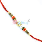 Diamond in Golden Star and Pearl Beads Rakhi