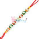 Silver Base Diamond Rakhi with Designer Beads
