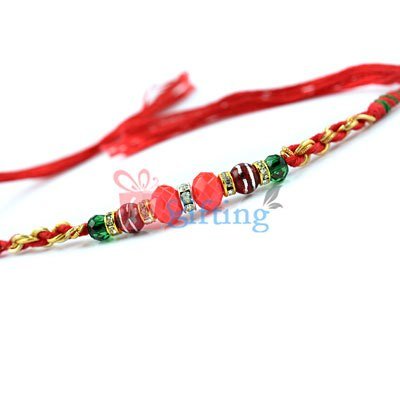 Ethnic Beauty of Beads with Diamonds Rakhi for Brother