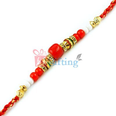 A Drop of Red Bead in Fancifully White and Golden Beads Rakhi