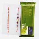 Elegant Rakhi Set of 2 with Cadbury Rum Raisin Temptation