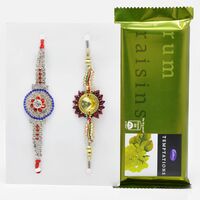 Beautiful Diamond Studded Rakhi Set of 2 with Premium Cadbury Rum Raisin Temptation