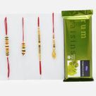 Elegant Pair of 2 Bhaiya-Bhabhi Rakhi with Mouth-Watering Cadbury Rum Raisin Temptation