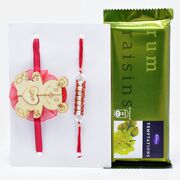Handmade Pearl Rakhi with Teddy Kids Rakhi and Cadbury Rum Raisin Temptation