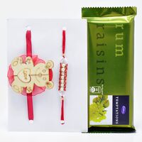 Handmade Pearl Rakhi with Teddy Kids Rakhi and Cadbury Rum Raisin Temptation