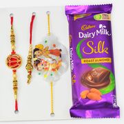 Set of Three Family Set of Rakhis with Dairy Milk Roast Almond Chocolate