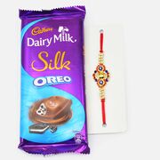 Dairy Milk Silk Oreo Chocolate with Simple Blue and Golden Jewel Rakhi