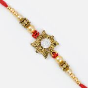Central Studded Diamonds on Leaves with Golden Pearl Rakhi