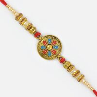 Magnificent Beauty of Golden Coin and Pearl Beaded Mauli Rakhi