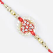 Round Pearl Base Golden and Diamond Designer Rakhi