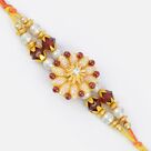Golden Pearl and Color Beaded Orbit Center Bead Rakhi