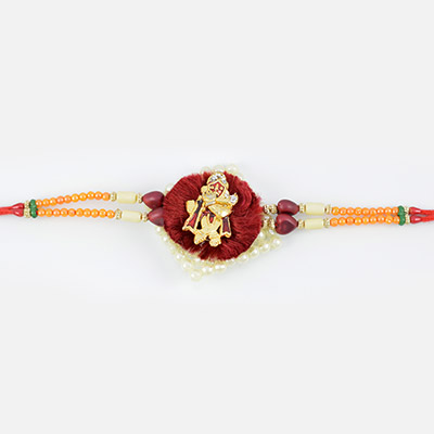 Golden look of lord Krishna with pearl at base with beads in authentic Red mauli Rakhi