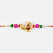 Marvellous Soft Ball Peacock Meena Rakhi