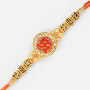 Red Diamond Swastik Golden Rakhi with Pearl