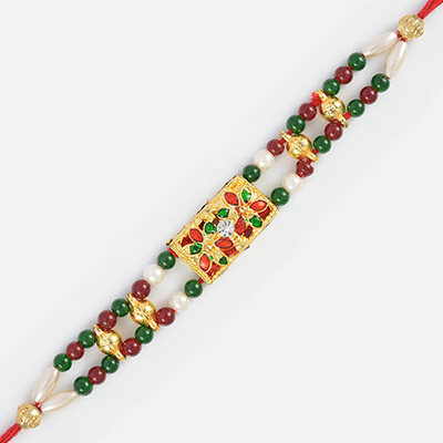 Unique Creation- Fancy Rakhi with Maroon and Pearl Beads