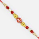 Simply Awesome Golden Tilak Fancy Rakhi