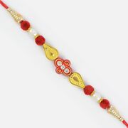 Simply Awesome Golden Tilak Fancy Rakhi