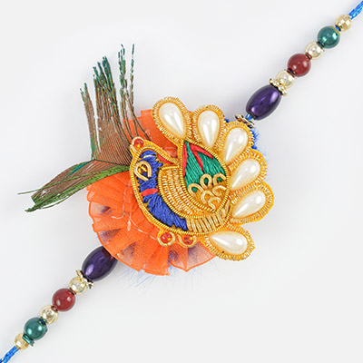 Amazing art of kundan and pearl with beads in Peacock Rakhi