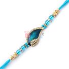 Western look of peacock feather studded with golden beads and diamonds
