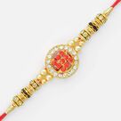 Central Embossed Swastik Round Shape Rakhi