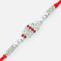Magnificently Designed Pearl and Jewel Linear Rakhi