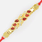 Six Diamonds and Red Stone on Golden Base Jewel Rakhi