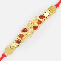 Six Diamonds and Red Stone on Golden Base Jewel Rakhi