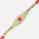 Magnificent Golden Base Rakhi with Studded Small Red Diamond Rakhi