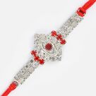 Oval Shaped Central Studded Red diamond Jewel Rakhi